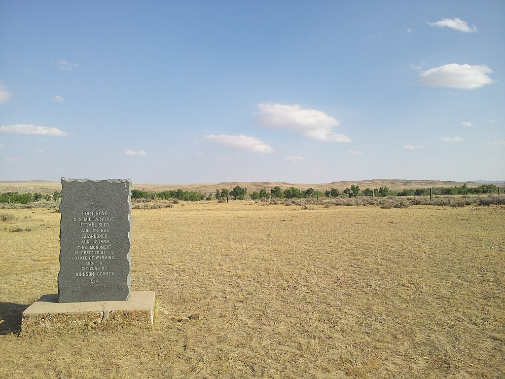 This shows the Fort Reno in the foreground, and the Powder River, a line of cottonwood trees, in the background.