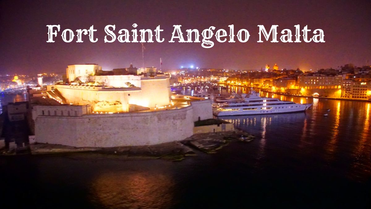 Night time view of Fort Saint Angelo in Malta and the Grand Harbor