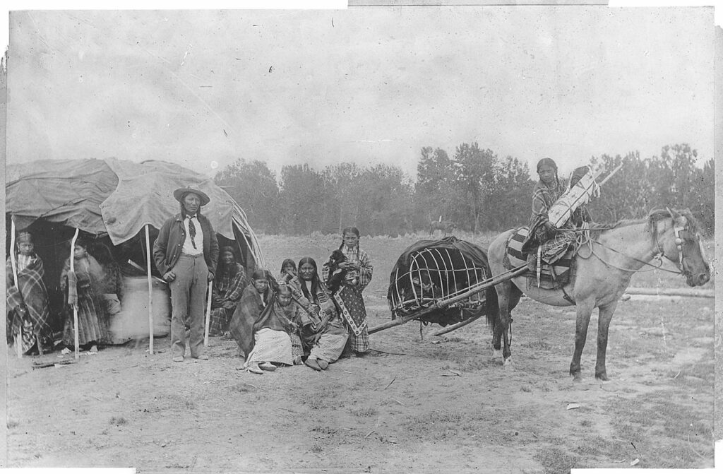 Stump Horn of the Cheyenne and his family with a horse