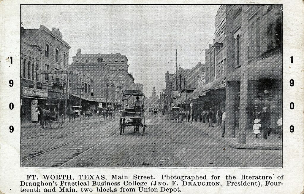 Postcard: Ft. Worth, Texas Main Street. Photographed for the literature of Draughon's Practial Business College (Jno. F. Draughon, President), Fourteenth and Main, two blocks from Union Depot, 1909