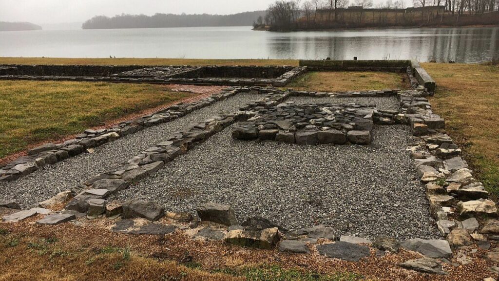 Foundation of the Tellico Blockhouse overlooks the Little Tennessee River on a cloudy winter day