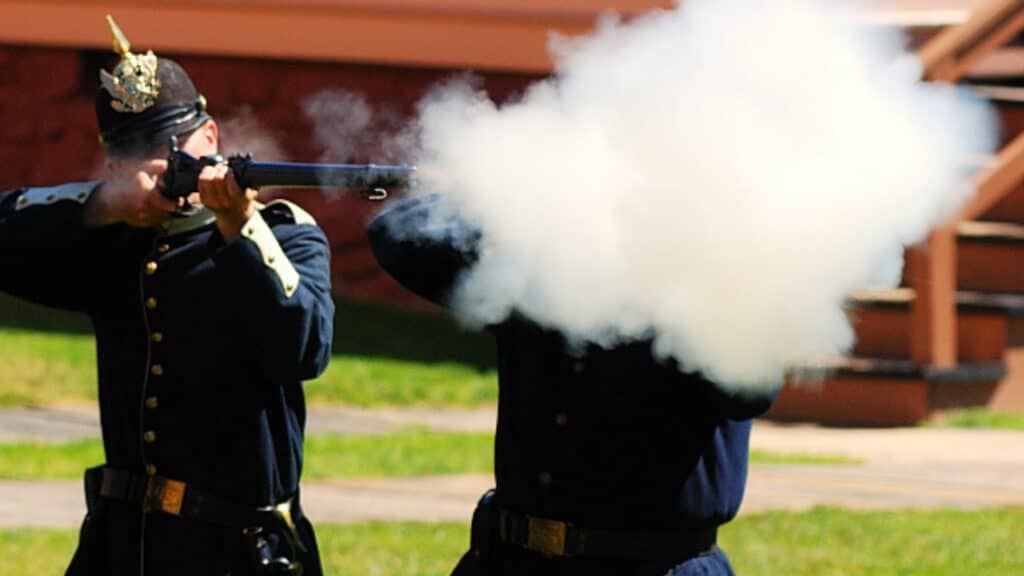 Soldier firing a Springfield Model 1873